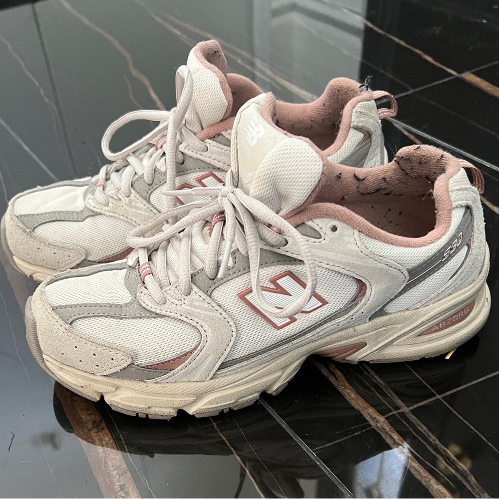 New Balance 530 sneaker in beige/taupe, gently worn